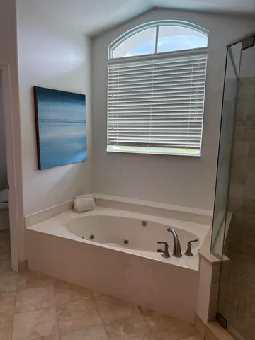 a view of balcony with furniture