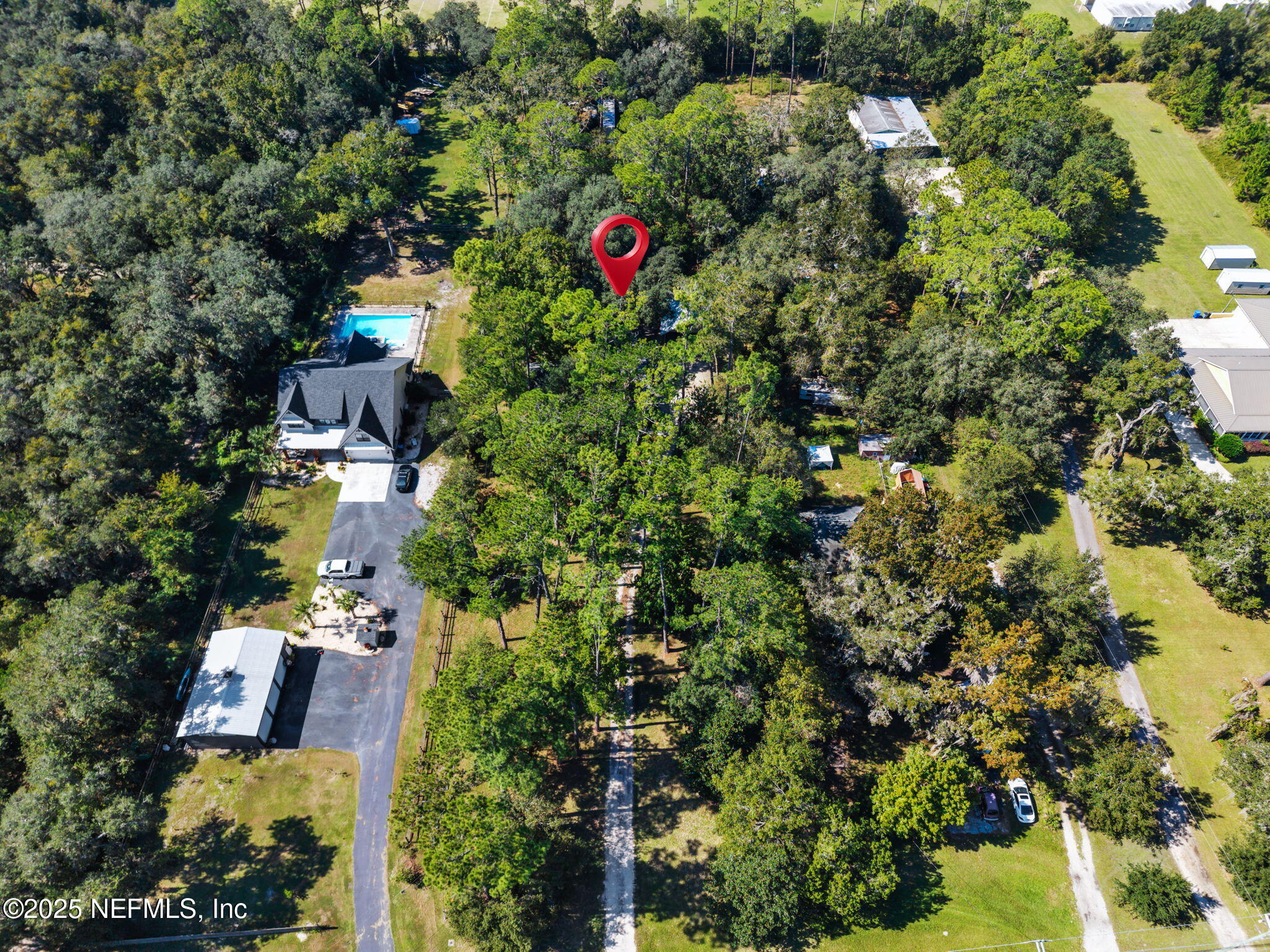 3541 Pacetti Road St. Augustine, FL 32092 - Photo 30 of 74 an aerial view of residential house with outdoor space and trees all around
