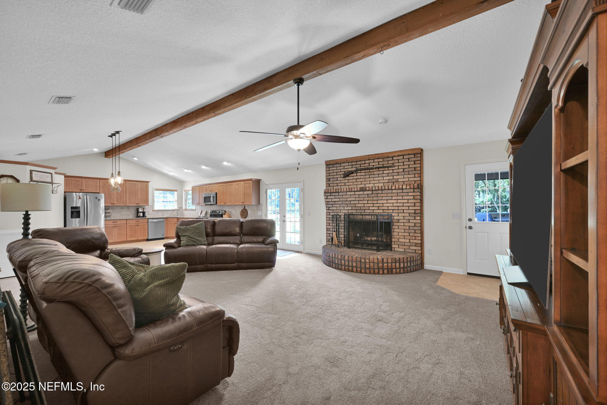 3541 Pacetti Road St. Augustine, FL 32092 - Photo 3 of 74 a living room with furniture and a fireplace