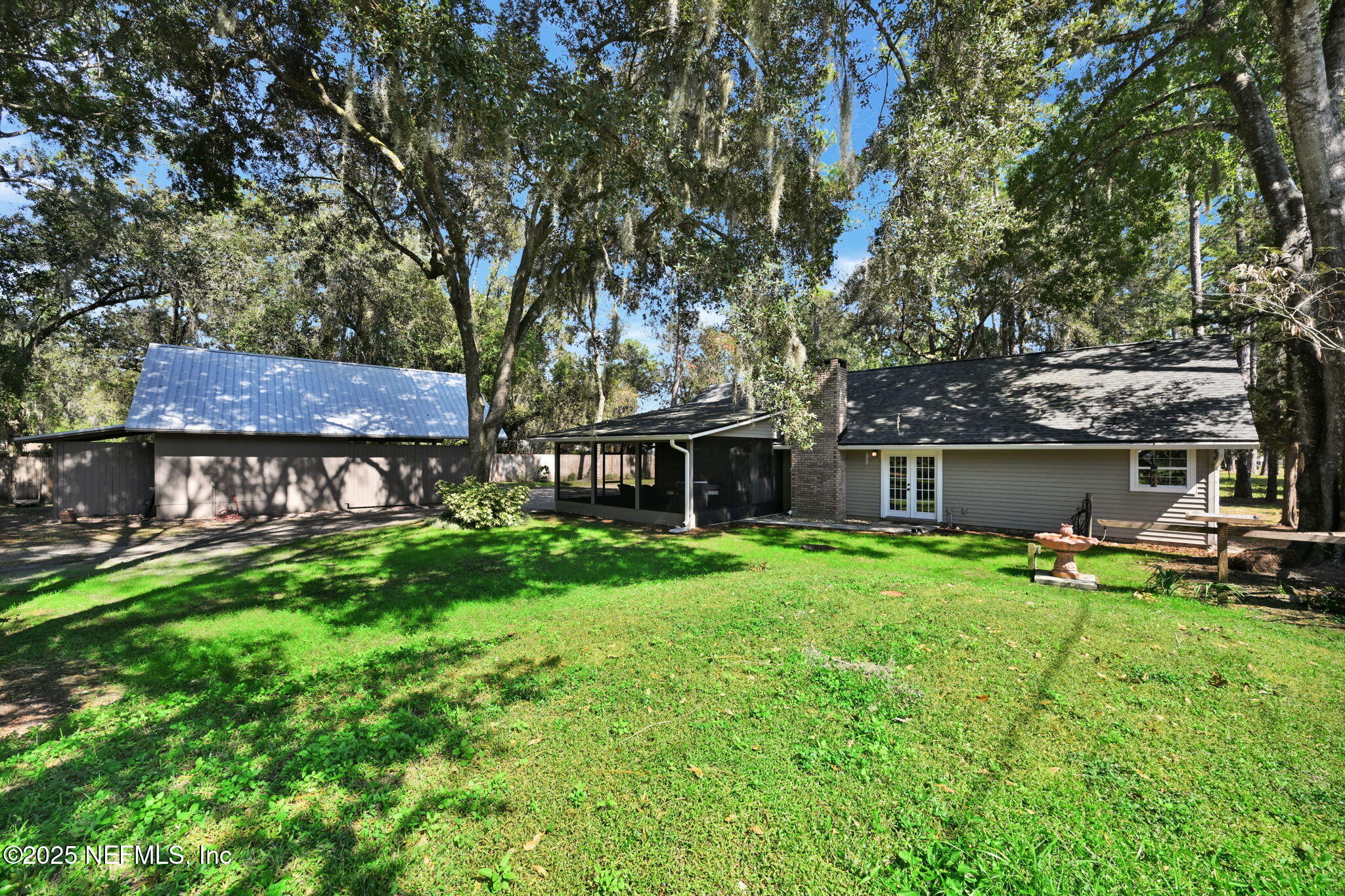 3541 Pacetti Road St. Augustine, FL 32092 - Photo 45 of 74 a view of a house with backyard and sitting area