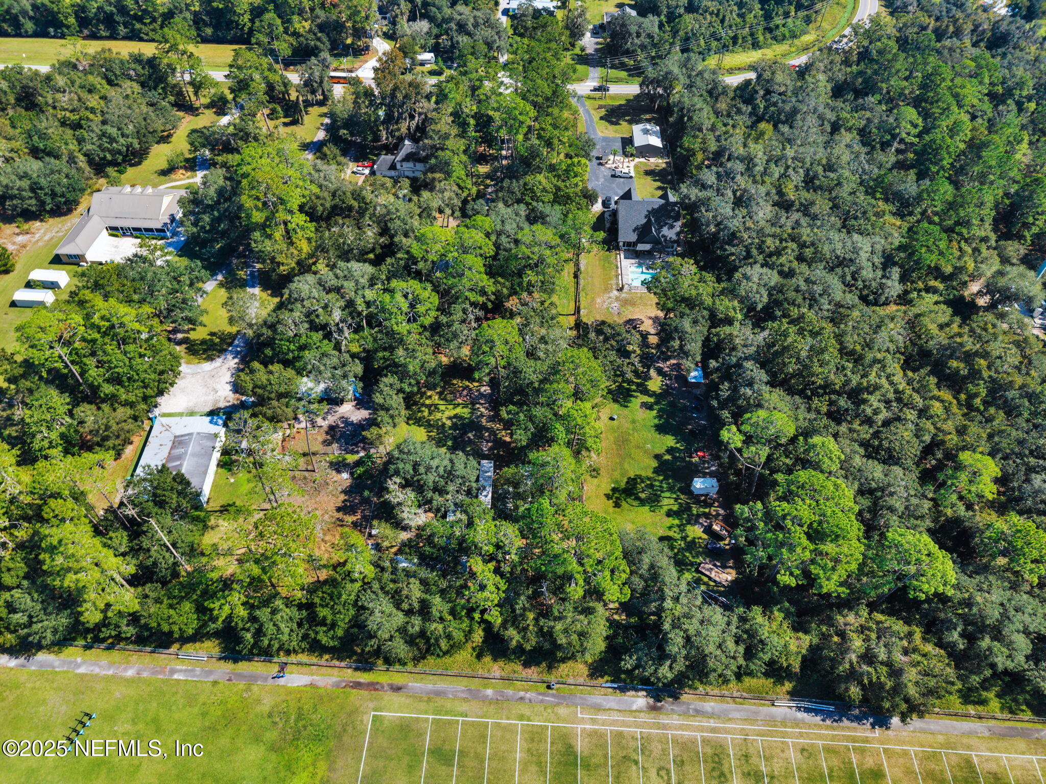3541 Pacetti Road St. Augustine, FL 32092 - Photo 58 of 74 an aerial view of residential house with outdoor space and trees all around