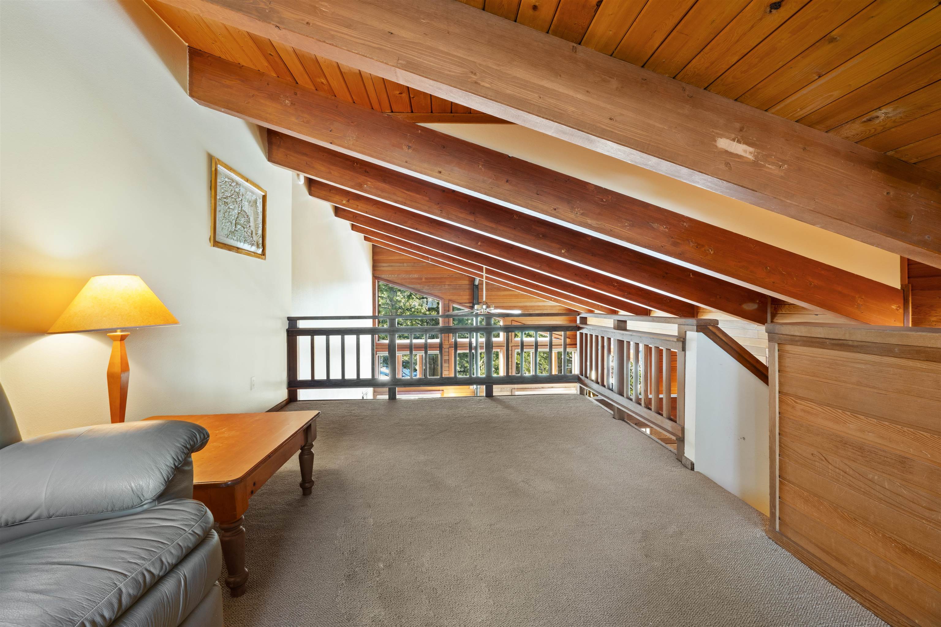 36 Ski Trails Road, Unit 8 Mammoth Lakes, CA 93546 - Photo 11 of 29 a balcony with furniture and a potted plant