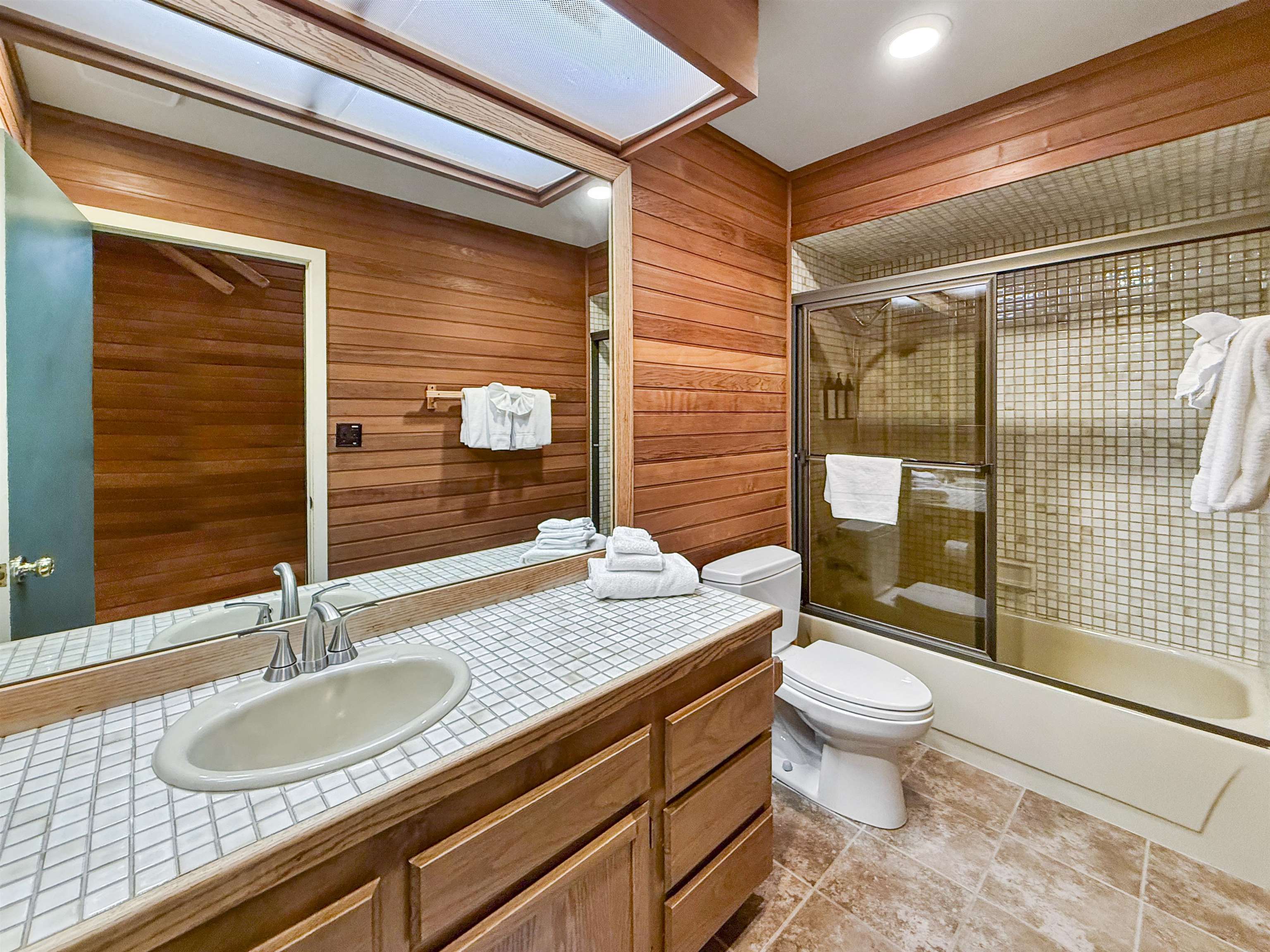36 Ski Trails Road, Unit 8 Mammoth Lakes, CA 93546 - Photo 14 of 29 a bathroom with a granite countertop sink toilet and shower