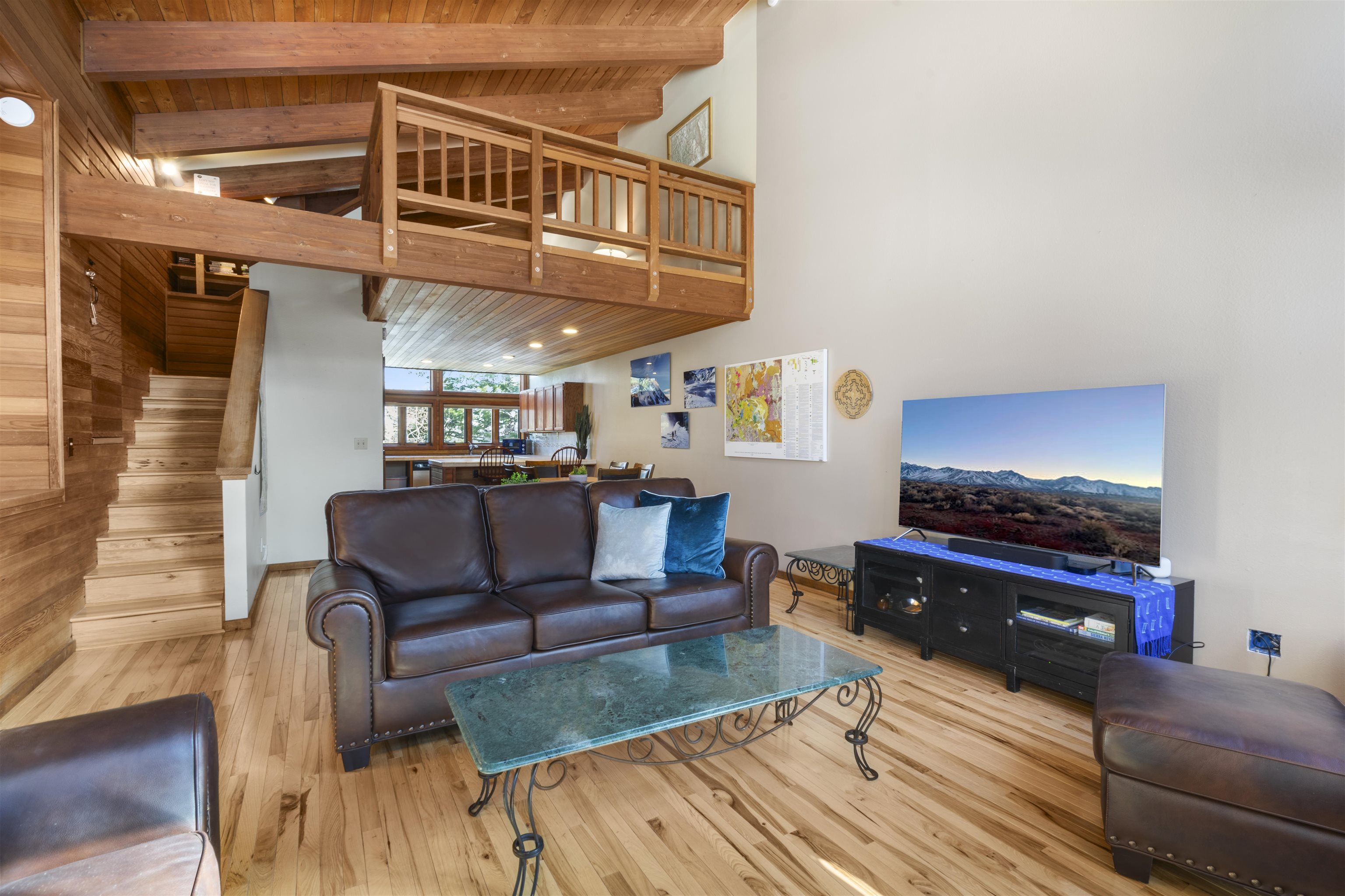 36 Ski Trails Road, Unit 8 Mammoth Lakes, CA 93546 - Photo 2 of 29 a living room with furniture and a fireplace