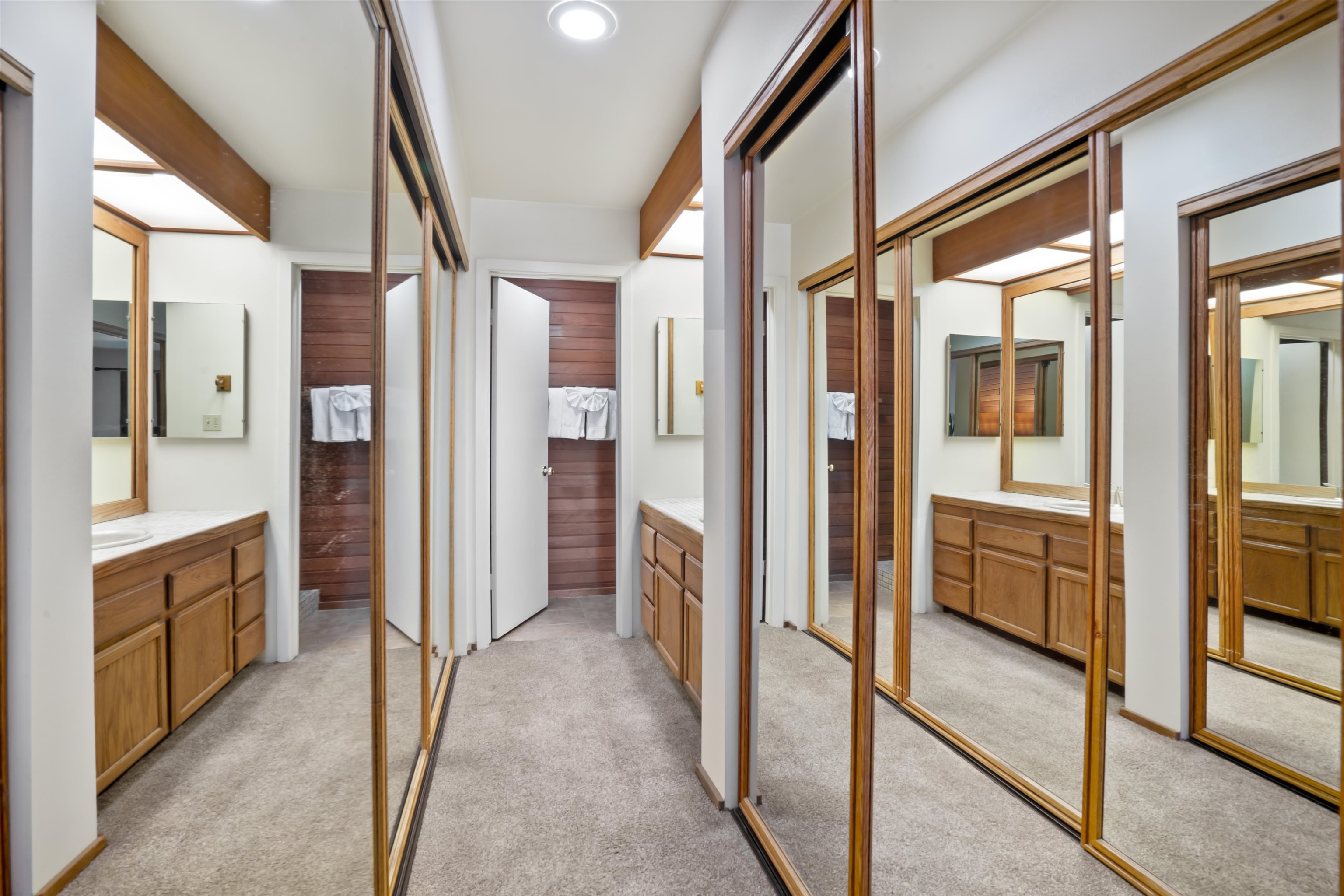 36 Ski Trails Road, Unit 8 Mammoth Lakes, CA 93546 - Photo 22 of 29 a hall with stainless steel appliances granite countertop cabinets and a glass door