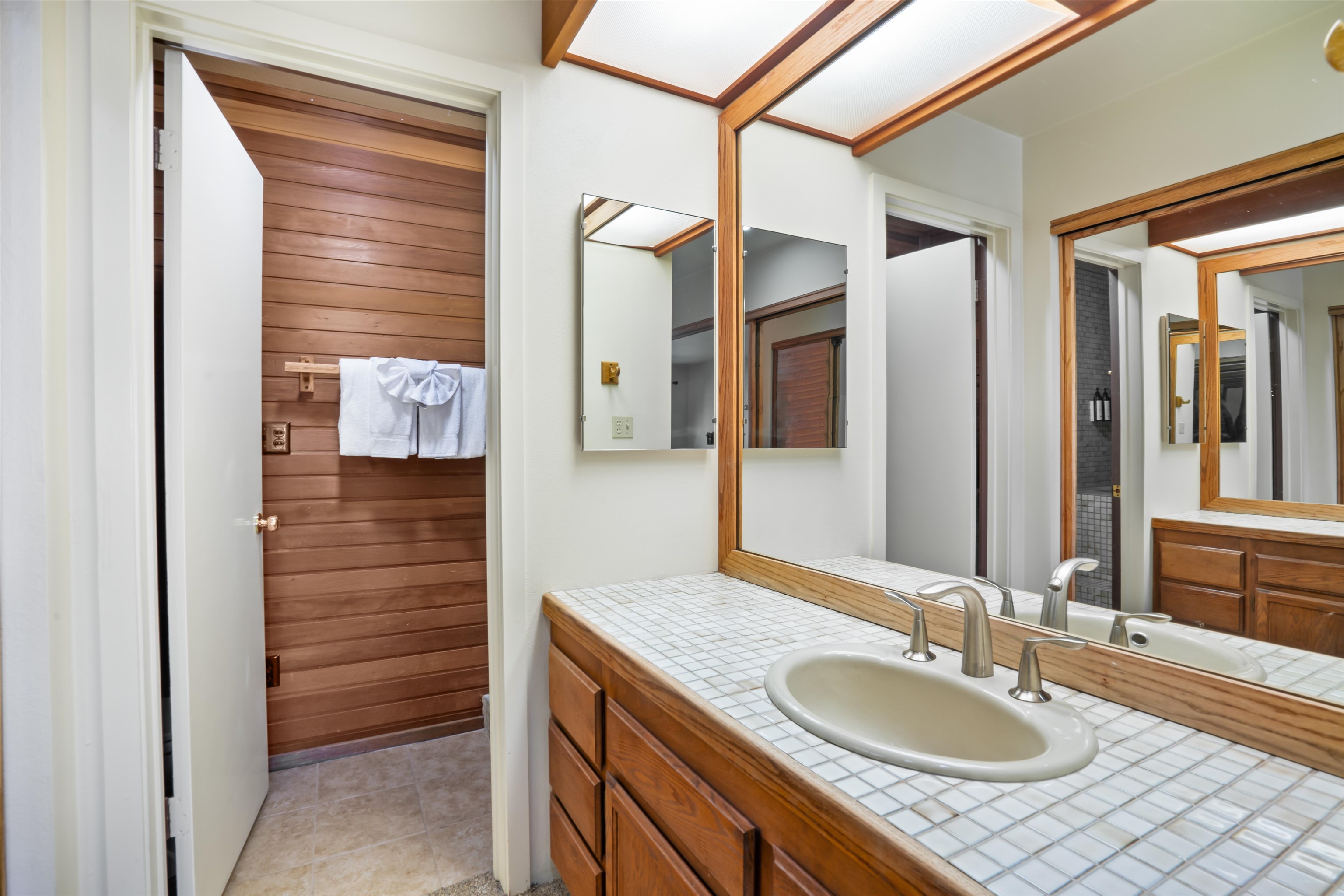 36 Ski Trails Road, Unit 8 Mammoth Lakes, CA 93546 - Photo 23 of 29 a bathroom with a sink and a mirror