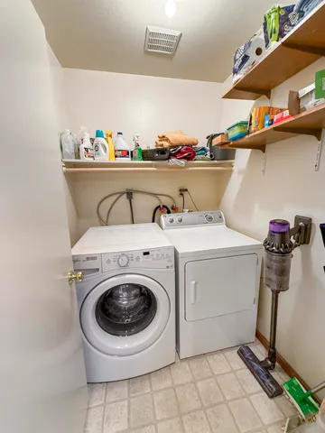 a view of a building with a yard