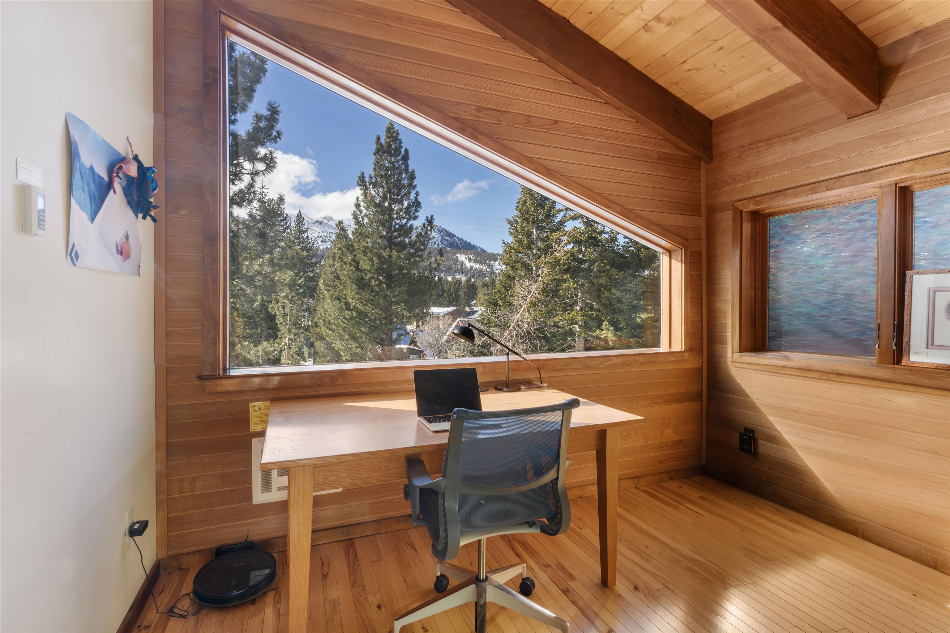 36 Ski Trails Road, Unit 8 Mammoth Lakes, CA 93546 - Photo 4 of 29 a view of a chairs and table in a balcony