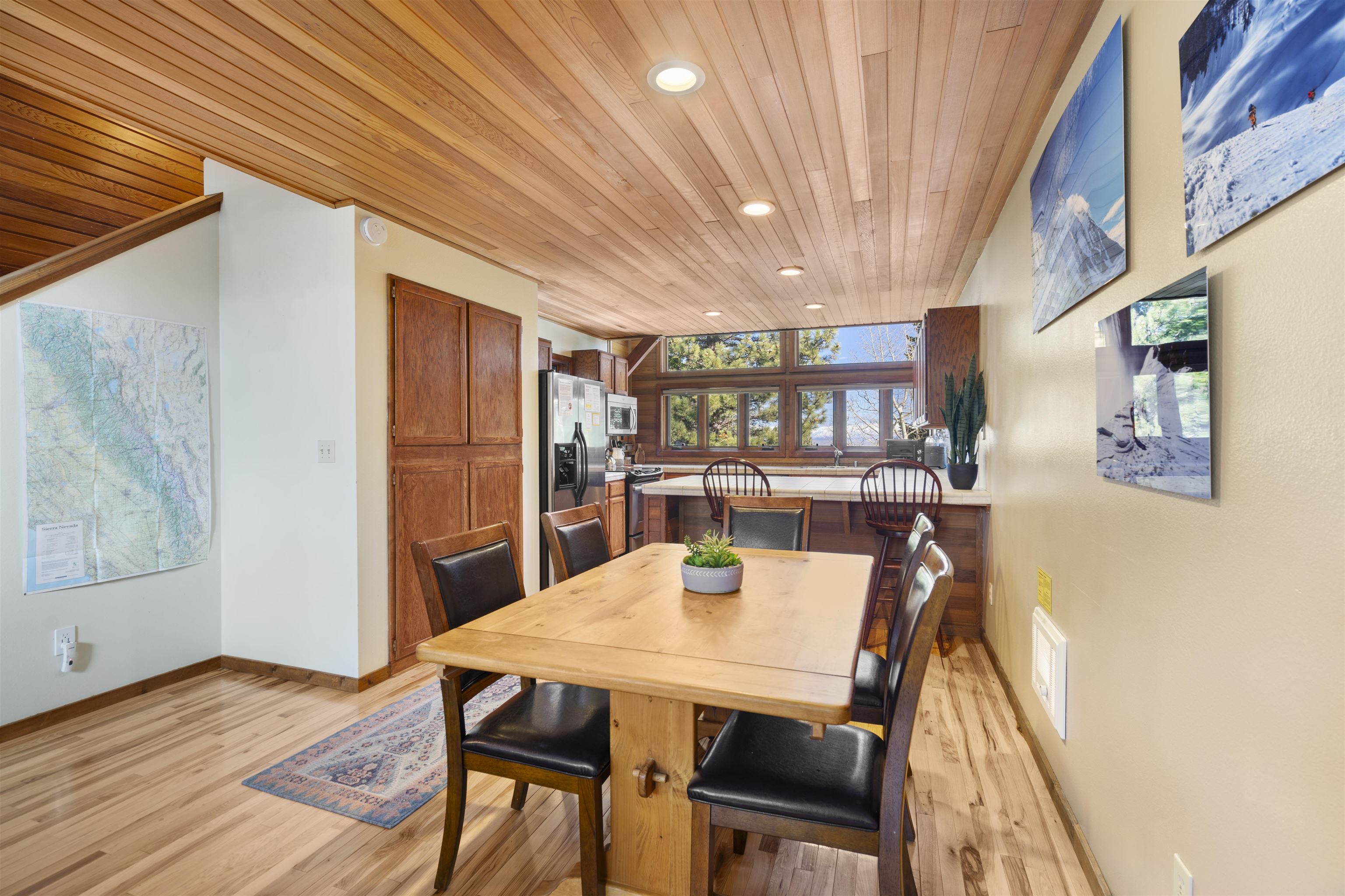 36 Ski Trails Road, Unit 8 Mammoth Lakes, CA 93546 - Photo 6 of 29 a view of a dining room with furniture and wooden floor