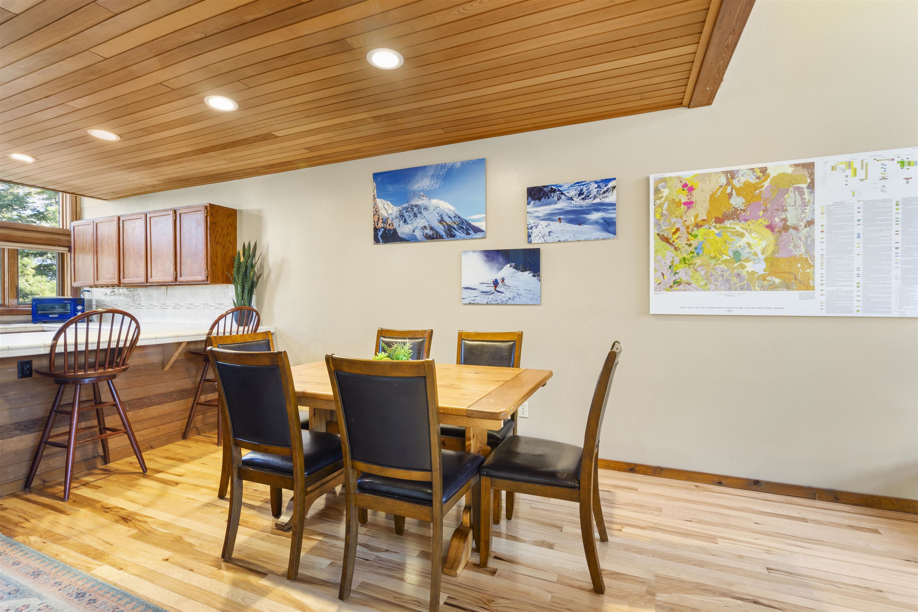 36 Ski Trails Road, Unit 8 Mammoth Lakes, CA 93546 - Photo 7 of 29 a view of a dining room with furniture and wooden floor