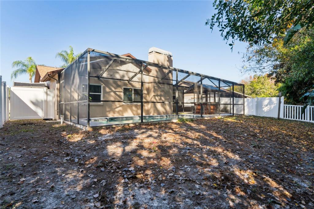 8357 Matthew Drive New Port Richey, FL 34653 - Photo 56 of 78 a view of a house with a yard