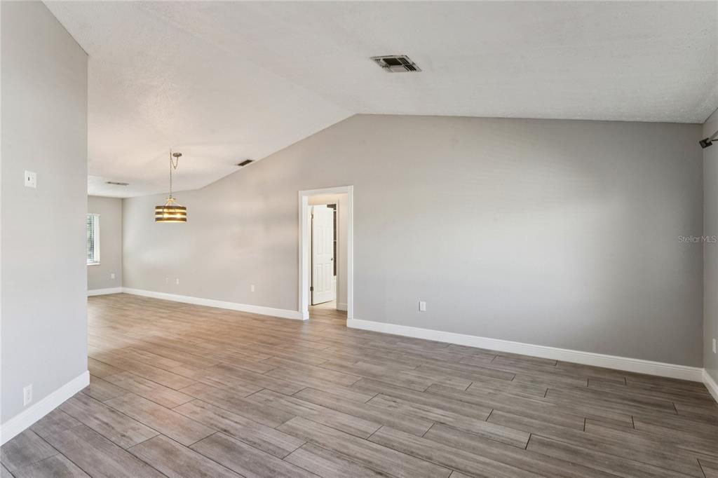 8357 Matthew Drive New Port Richey, FL 34653 - Photo 6 of 78 a view of an empty room
