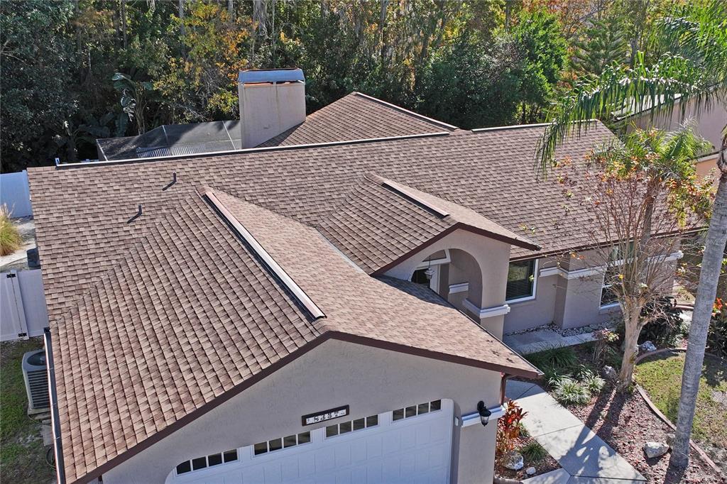 8357 Matthew Drive New Port Richey, FL 34653 - Photo 75 of 78 a aerial view of a house with a yard