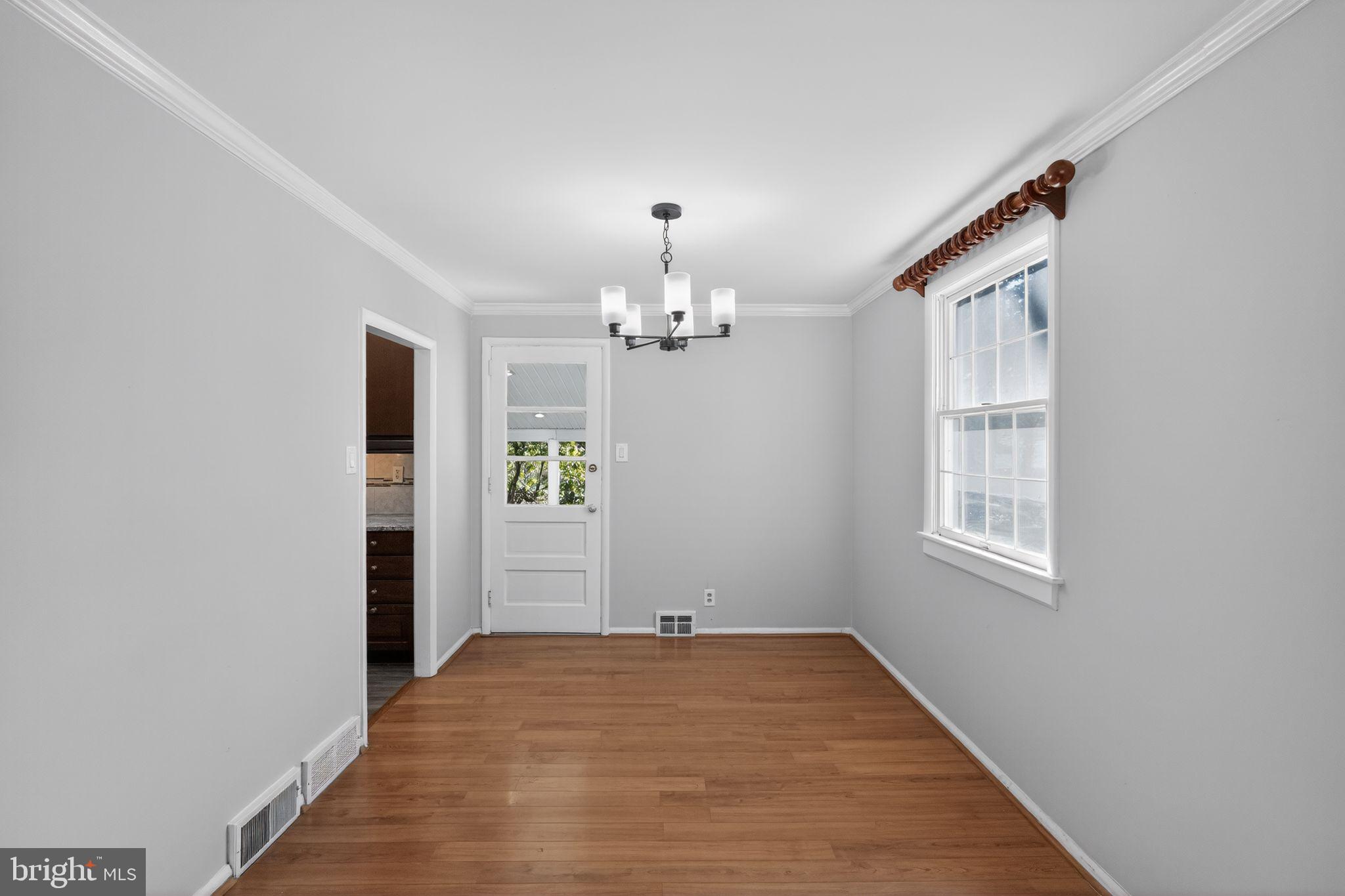 1602 Mulberry Road Flourtown, PA 19031 - Photo 9 of 25 Dining Area with door to Screened In Porch