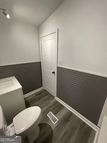 a bathroom with a toilet