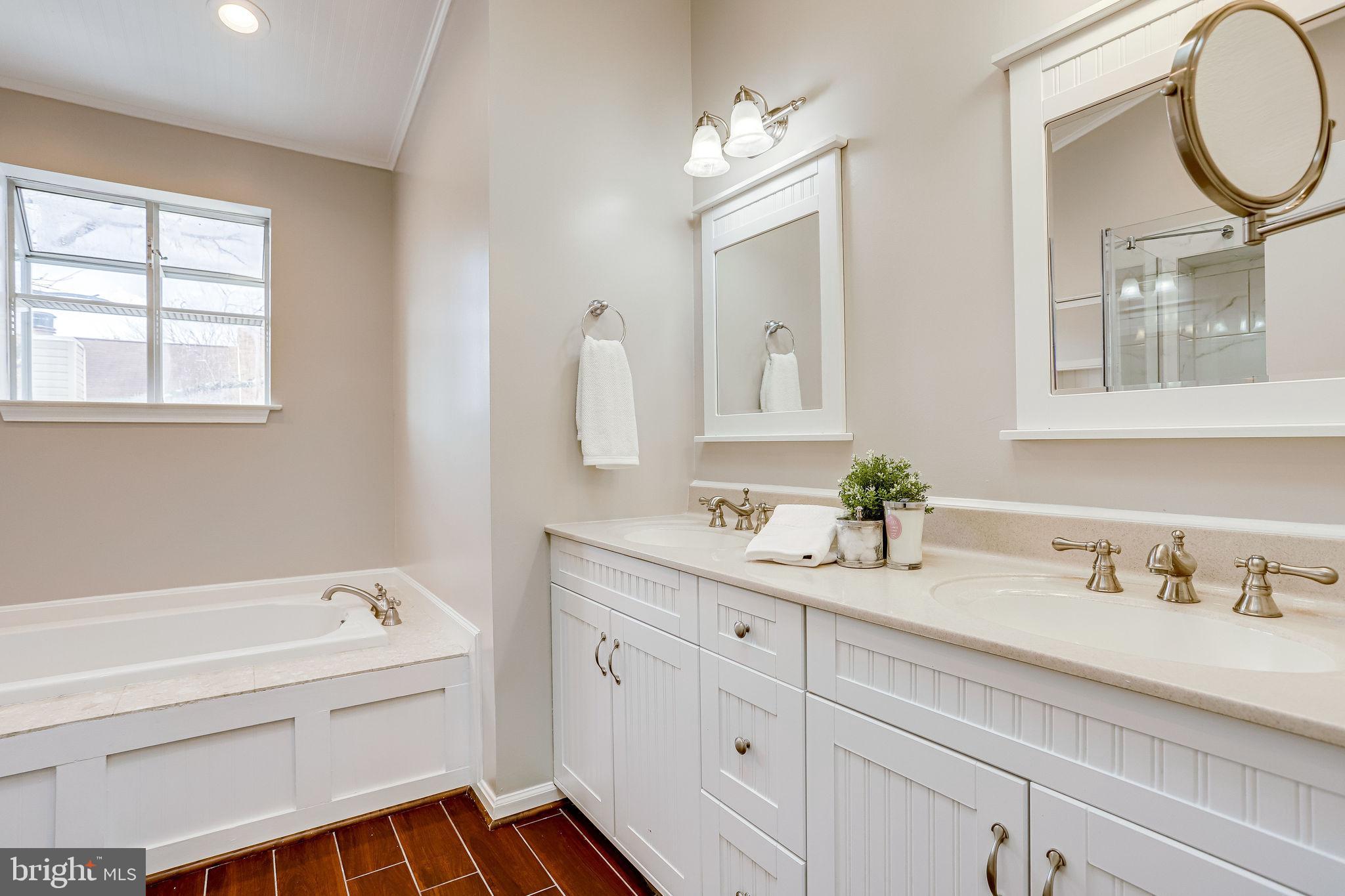 2378 Hunters Square Court Reston, VA 20191 - Photo 25 of 41 Spa-like primary bathroom with double vanities