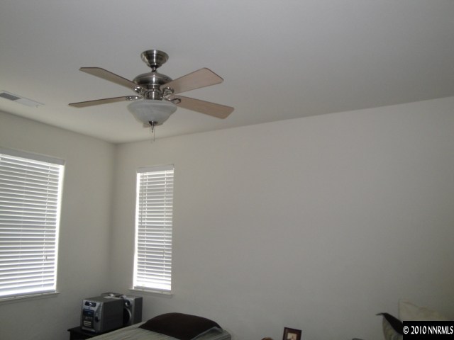 1625 Sawtooth Trail Reno, NV 89523 - Photo 6 of 9 a view of room with a window and a fan