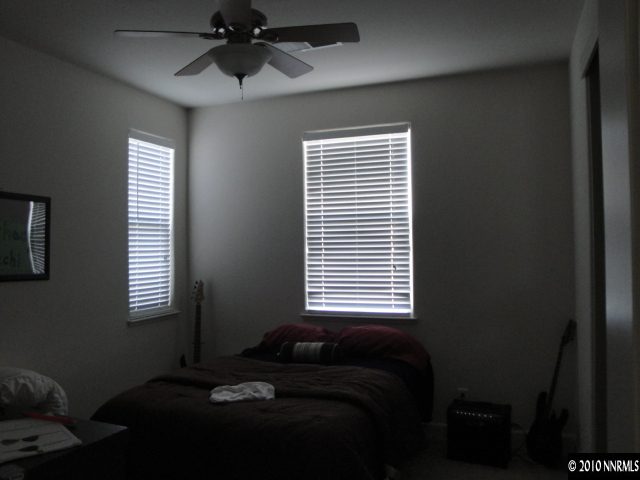 1625 Sawtooth Trail Reno, NV 89523 - Photo 8 of 9 a bed sitting in a bedroom next to a window