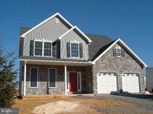 457 Heisey Road Mechanicsburg, PA 17055 - Photo 1 of 1 a front view of a house with a yard and garage