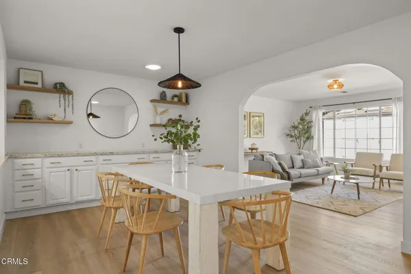 a living room with furniture and windows