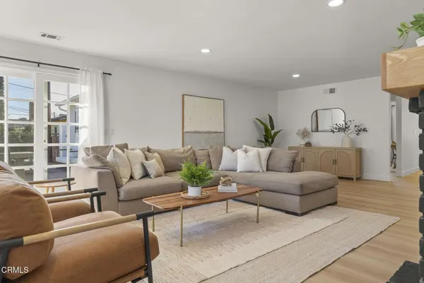 a kitchen with a table and chairs in it