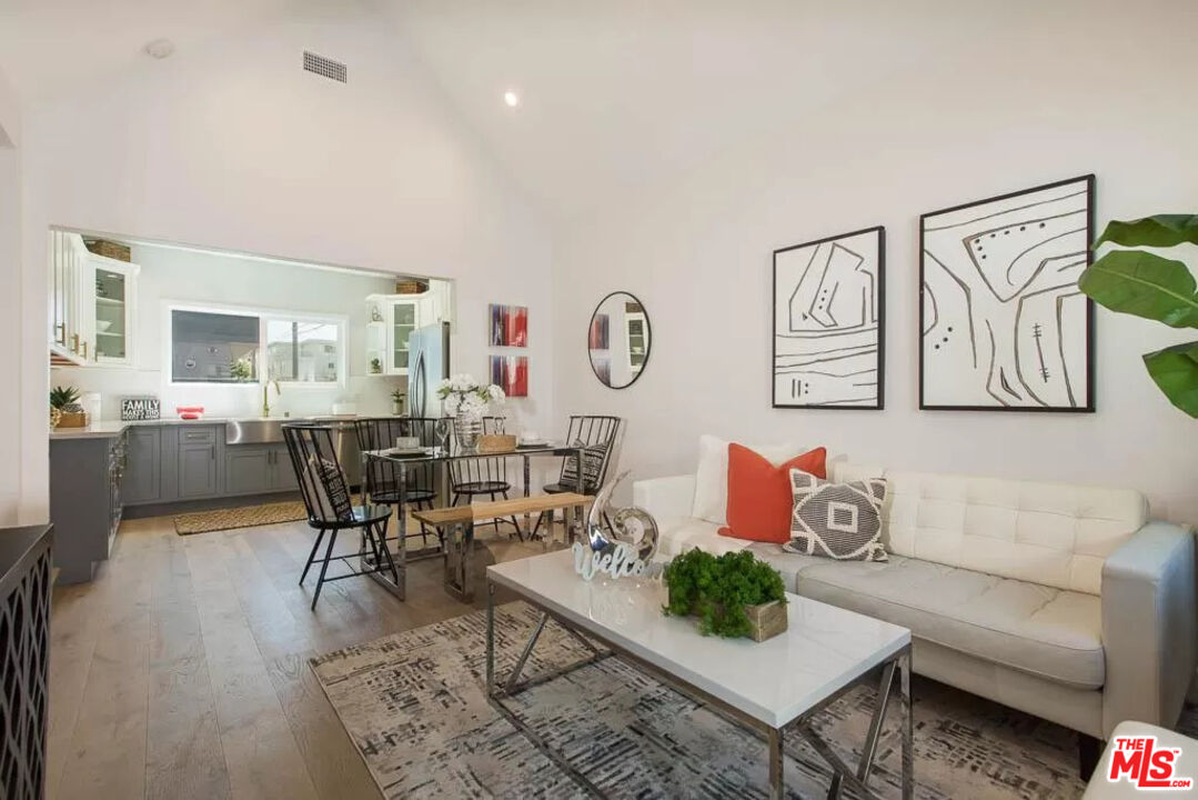 2419 Walnut Avenue Venice, CA 90291 - Photo 3 of 16 a living room with furniture and wooden floor