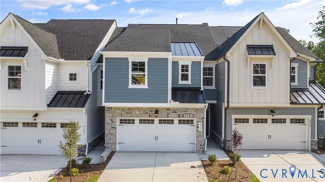 a view of a house with a barbeque