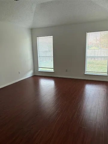 a bathroom with a sink and a window