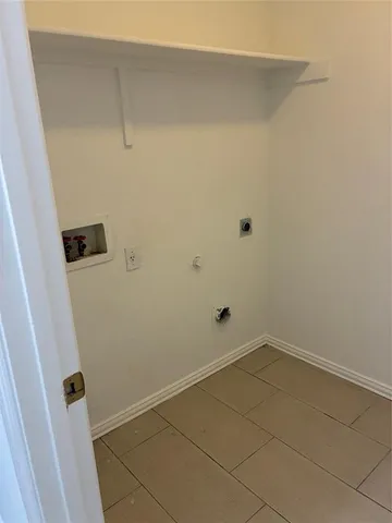 a view of a backyard with a garden and deck