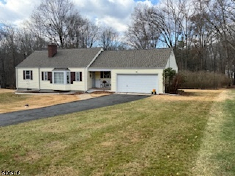 469 Bayberry Road Bridgewater, NJ 08807 - Photo 1 of 12 a front view of a house with trees and yard