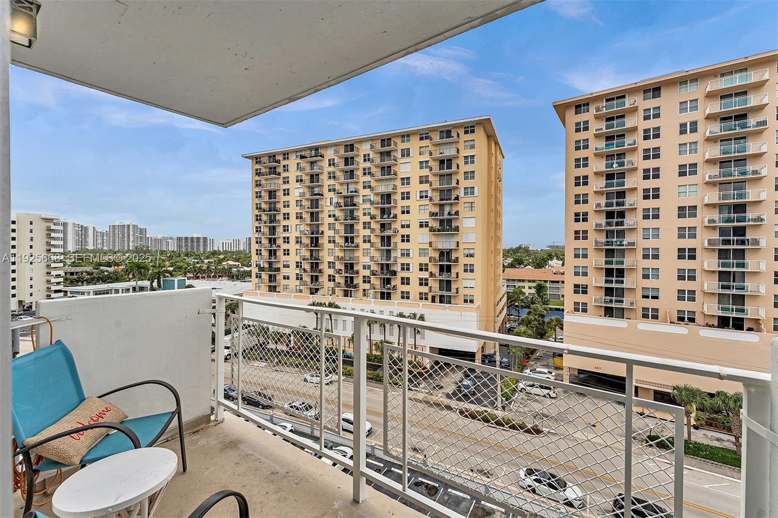 430 Golden Isles Drive, Unit 803 Hallandale Beach, FL 33009 - Photo 26 of 48 a balcony with a city view