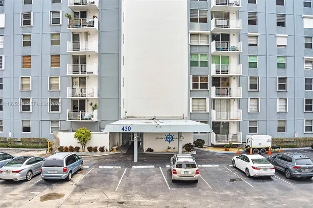 a view of a balcony with chairs