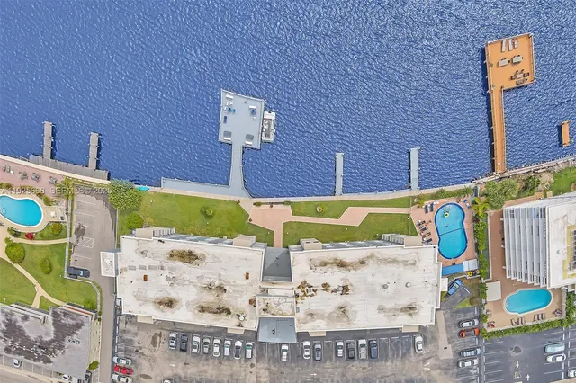 an aerial view of multiple houses with outdoor space