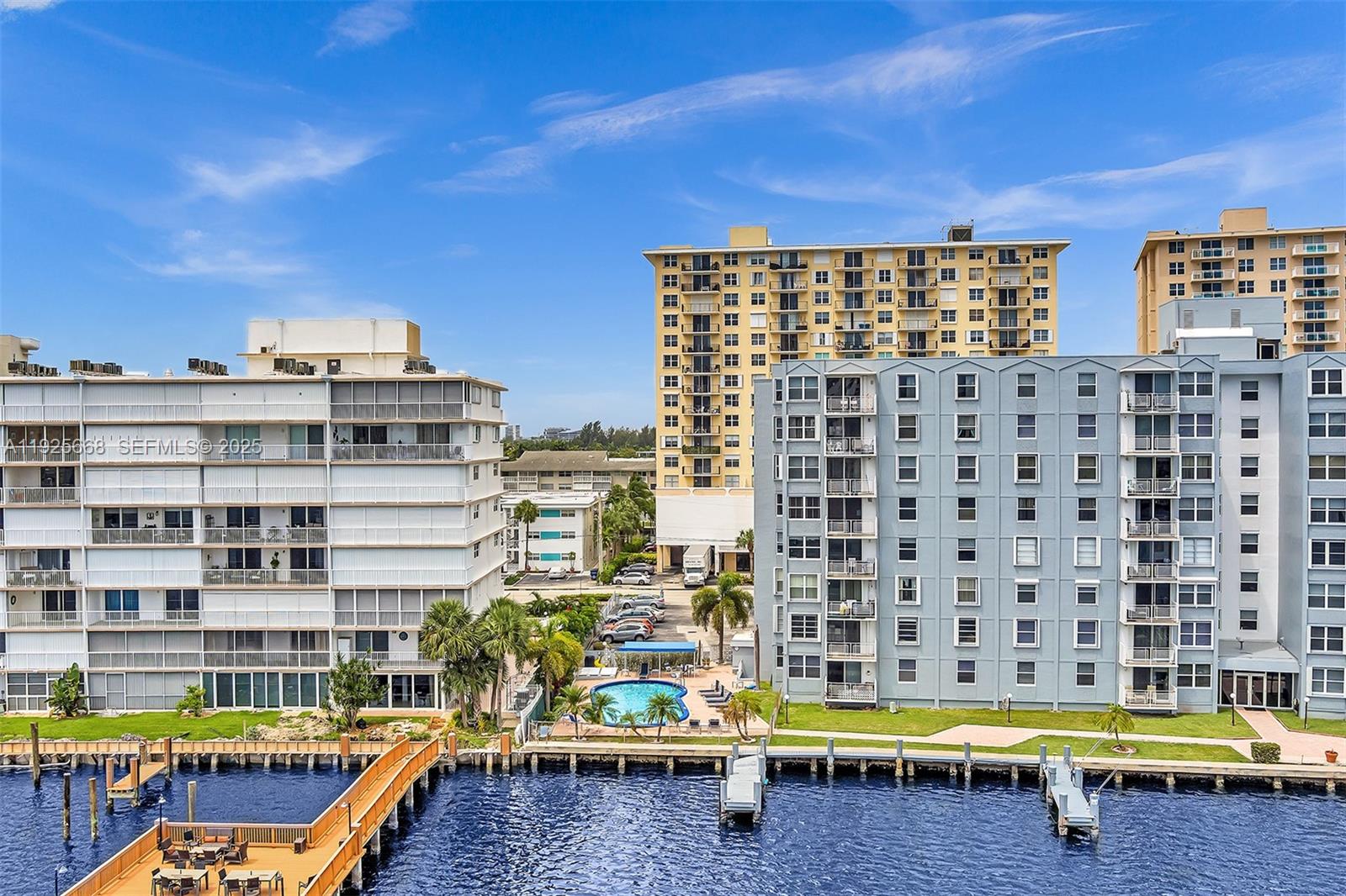 430 Golden Isles Drive, Unit 803 Hallandale Beach, FL 33009 - Photo 47 of 48 a view of a balcony with chairs