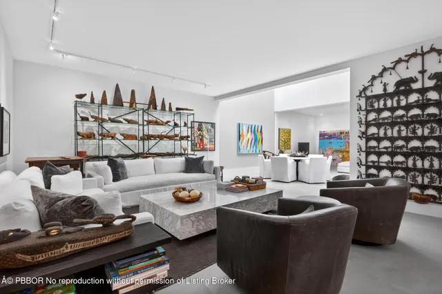a stove top oven sitting inside of a kitchen