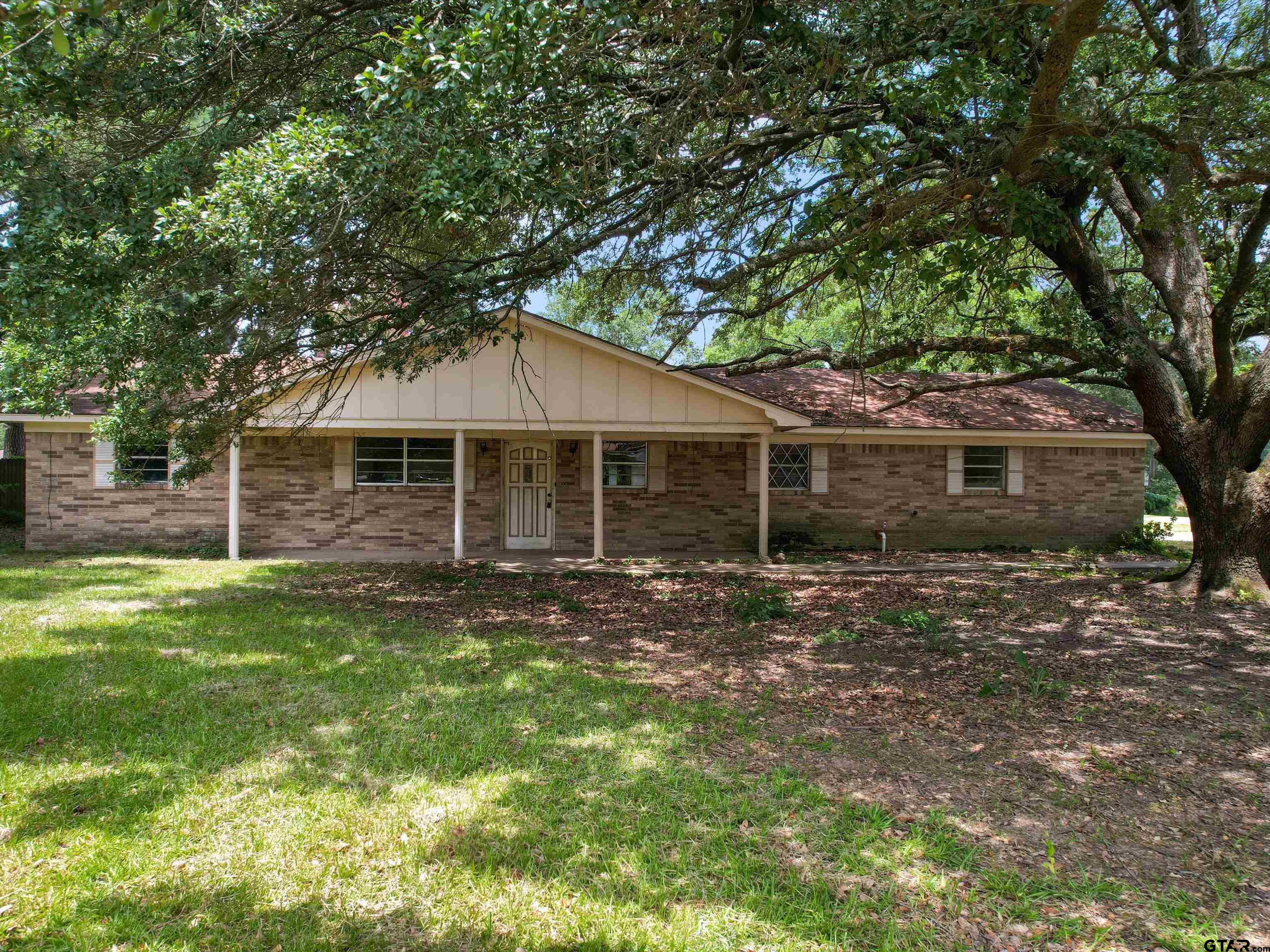 175 Stevens Street Gilmer, TX 75645 - Photo 1 of 25 front view of a house with a yard