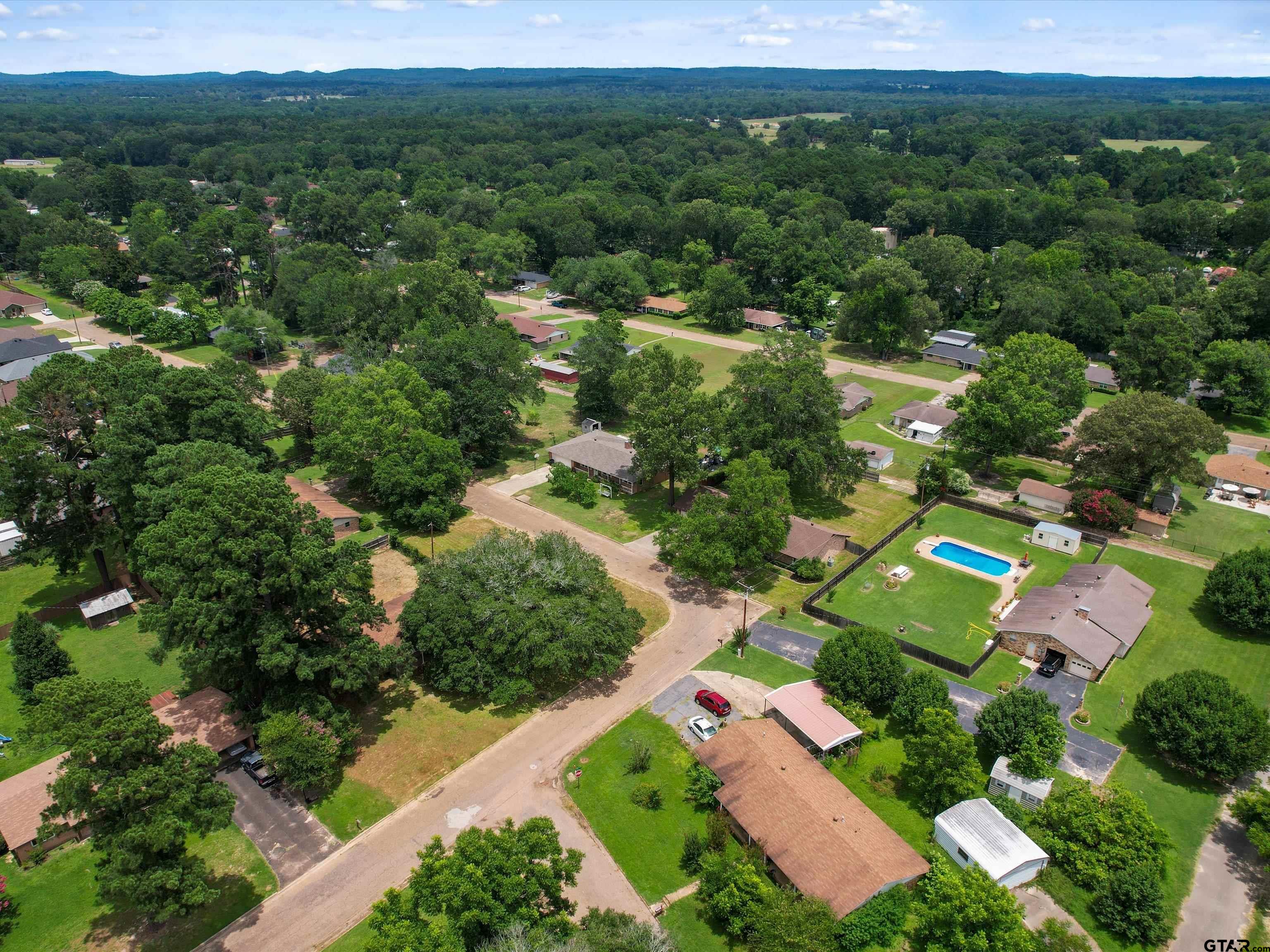 175 Stevens Street Gilmer, TX 75645 - Photo 4 of 25 an aerial view of multiple house
