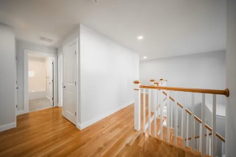 a view of entryway with wooden floor