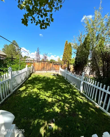 a view of a garden from a balcony