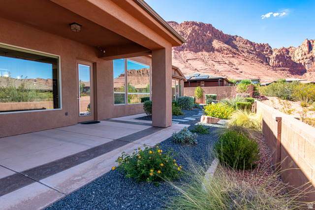 322 340 E Street Ivins, UT 84738 - Photo 51 of 61 Covered patio featuring a concrete surface with decorative dark gray banding