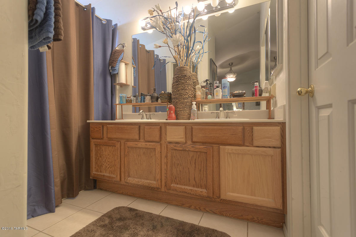 190 Camino Oceano Rio Rico, AZ 85648 - Photo 9 of 17 a view of a bathroom with a sink