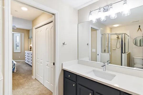 a view of a garden with a house