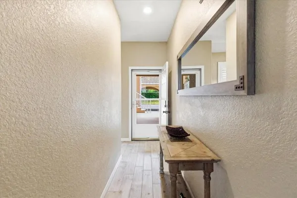 a kitchen with stainless steel appliances a stove microwave and sink