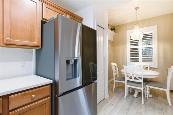 a bathroom with a sink a mirror and a window