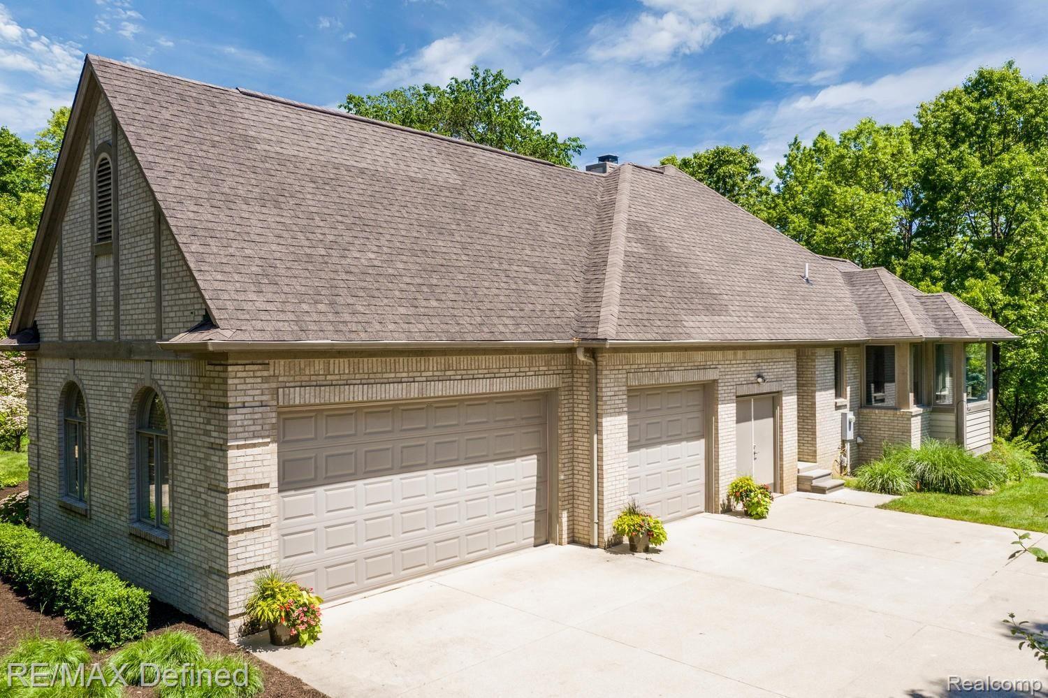 4205 Sheldon Road Rochester, MI 48306 - Photo 46 of 50 A large side entrance three car garage.