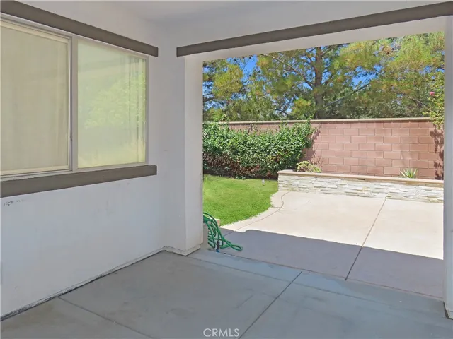 a view of a backyard with a garden