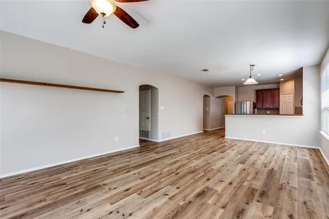 a view of a kitchen with a dishwasher and a cabinets