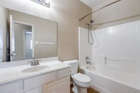 a backyard of a house with seating space