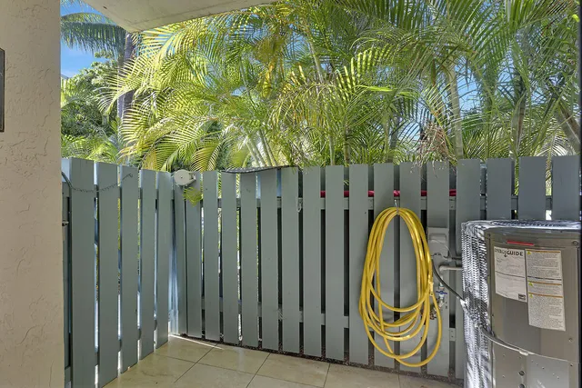 a view of a swimming pool with a backyard