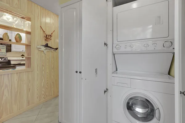 a view of a hallway with washer and dryer